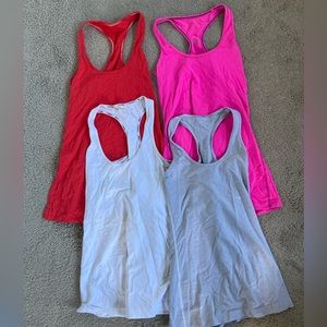 4 Lululemon tank tops, size 4